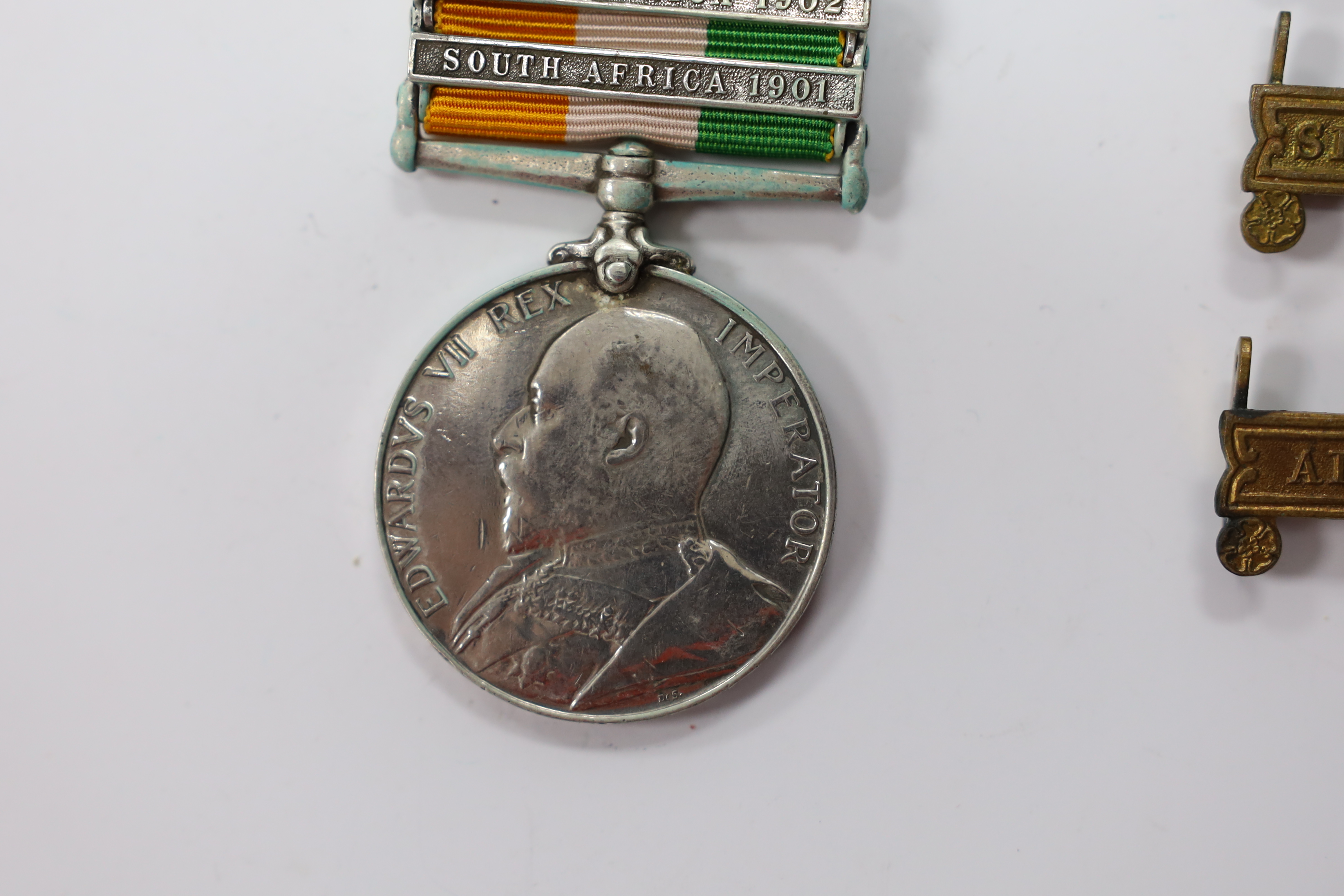 Assorted medals; two replica British North Borneo medals; Balaklava medallion; bronze GV medal; German China Campaign medal; bronze NRA medallion, unnamed